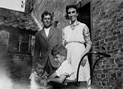 Mr & Mrs Lake with Tommie & Mary at White House Farm 1942 